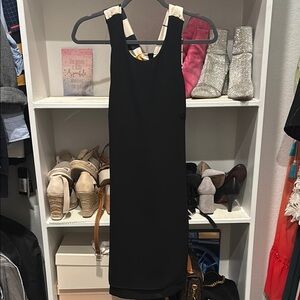 Elegant Black Dress with Cream Accents